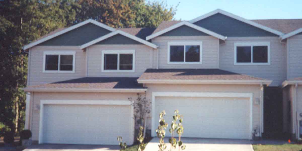 House front color elevation view for D-452 Triplex  house plans, triplex plans with garage, 25 ft wide house plans, D-452